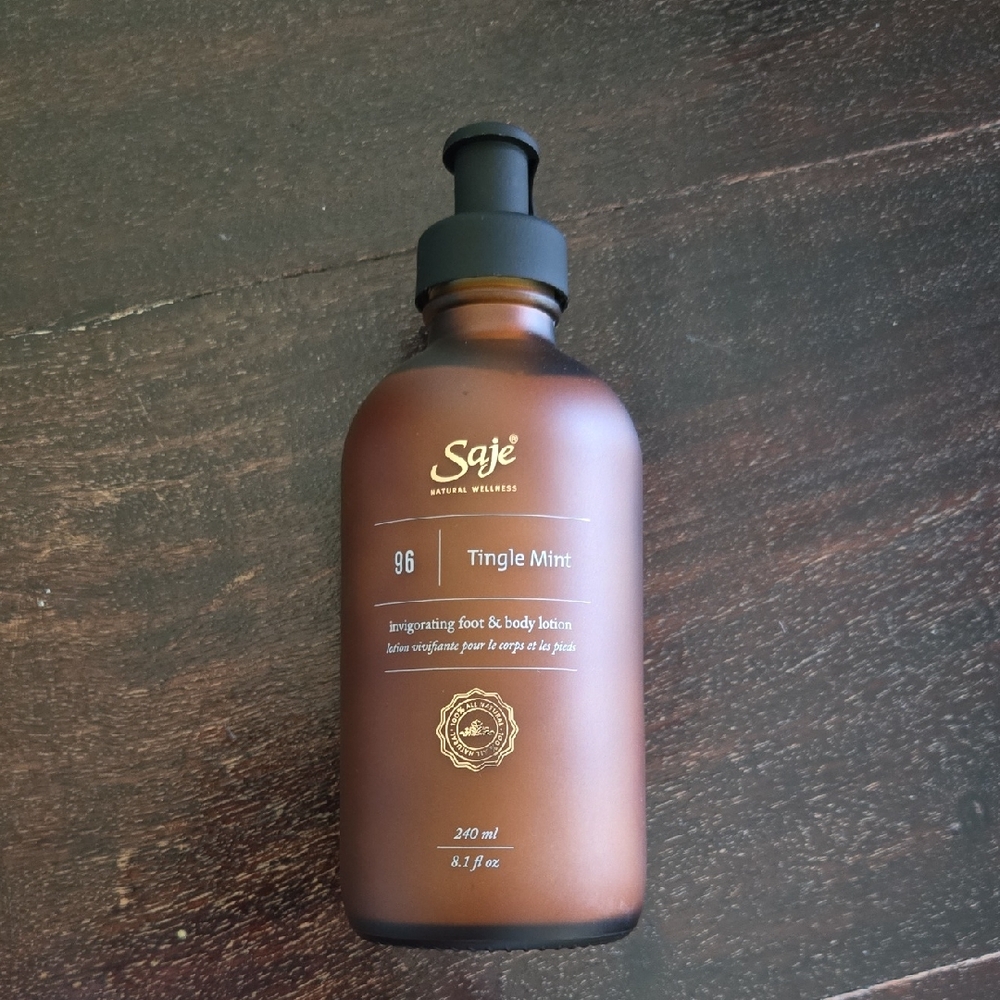 Saje Tingle Mint Invigorating Lotion in Brown Bottle